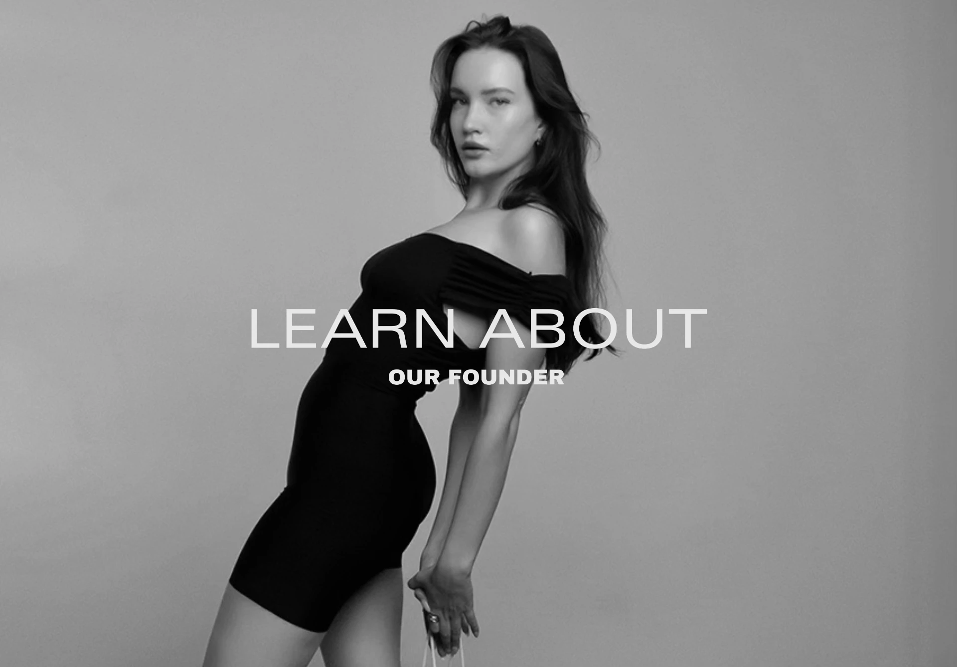 Black and white editorial beauty campaign banner — learn about our founder